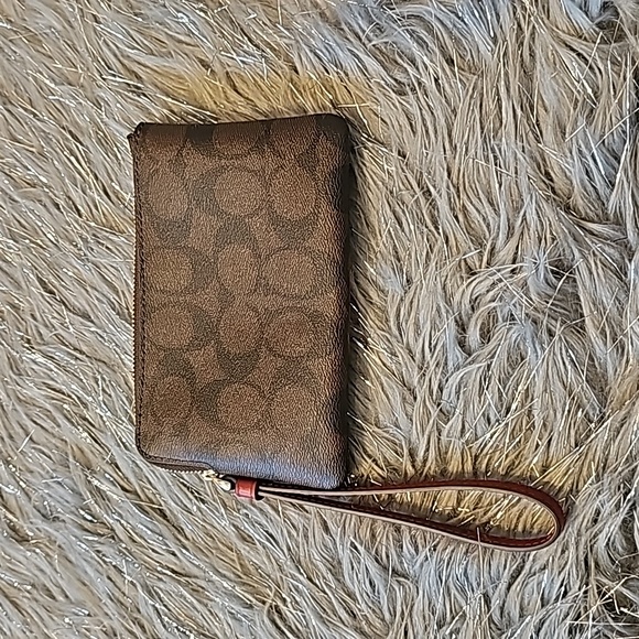 Coach Signature canvas corzip wristlet in gold/walnut/bold red. - Picture 2 of 5